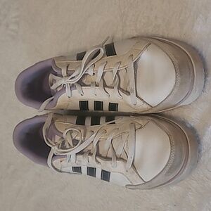 White and Black Sneakers with Purple Accents